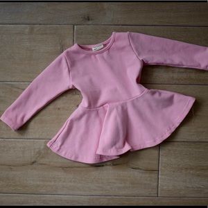 Pink peplum top